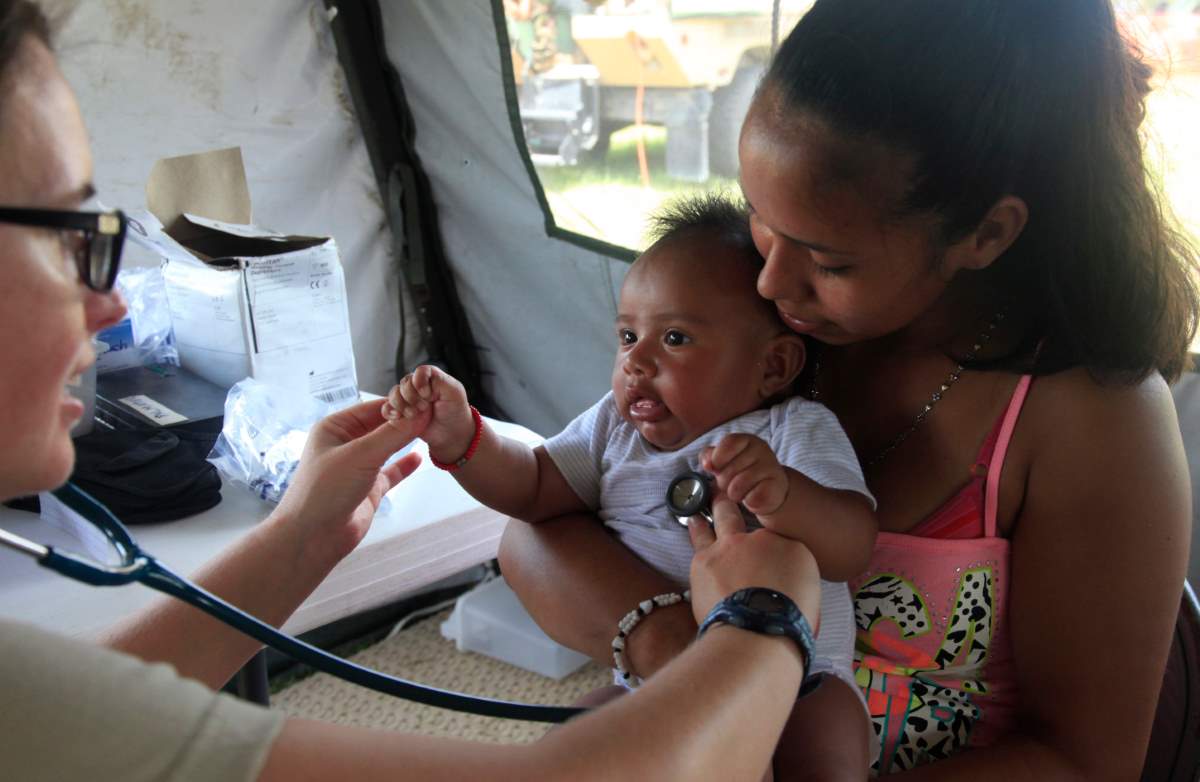 U.S. troops provide medical care in Belize
