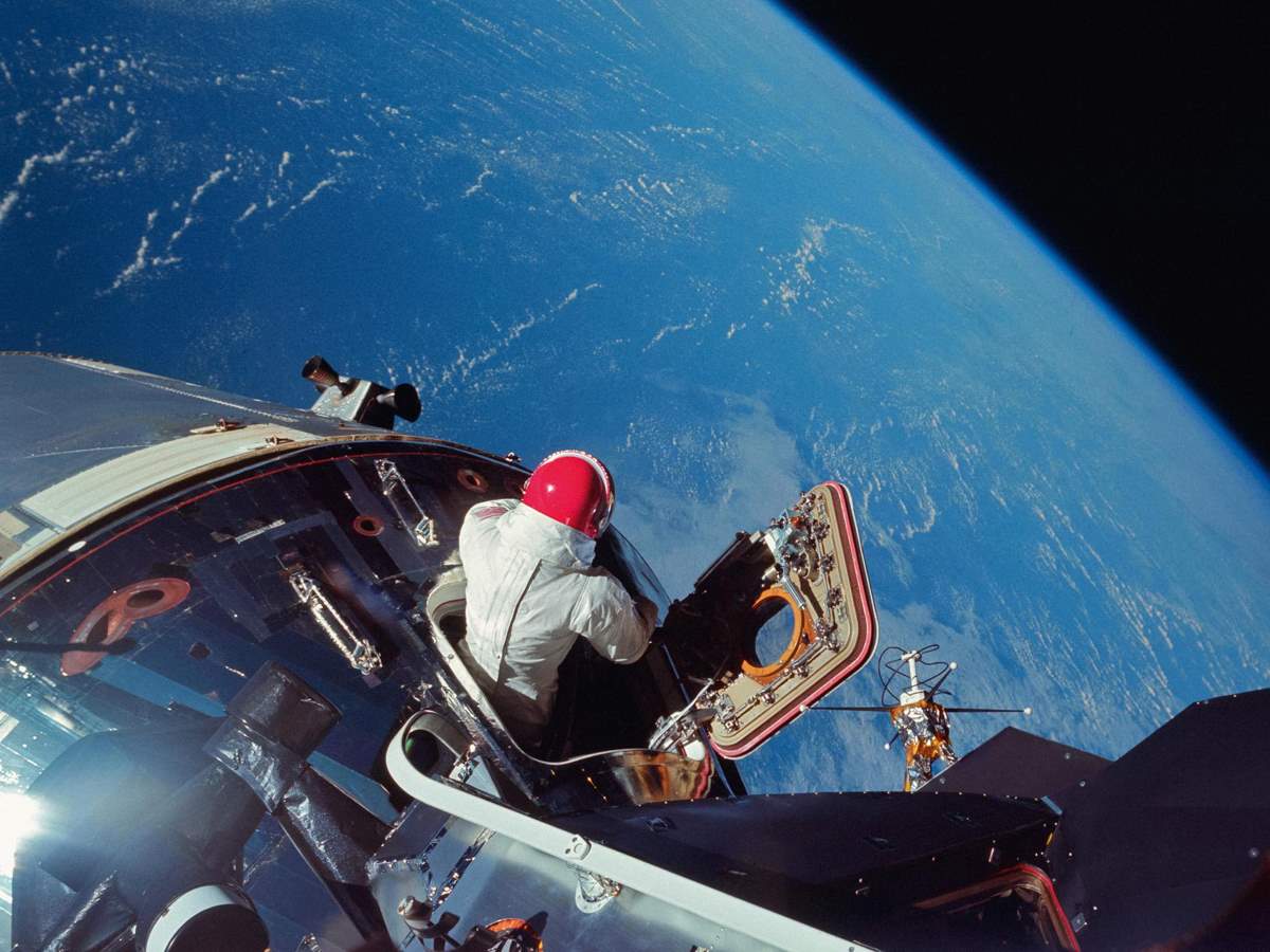 Astronaut Dave Scott emerges from the Apollo 9 Command Module "Gumdrop"