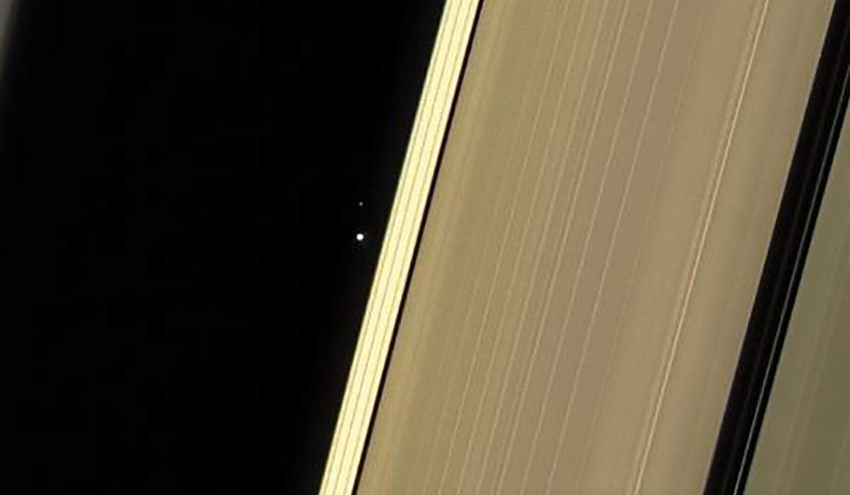 Earth and Moon as seen through Saturn's rings (2017 Cassini Image)